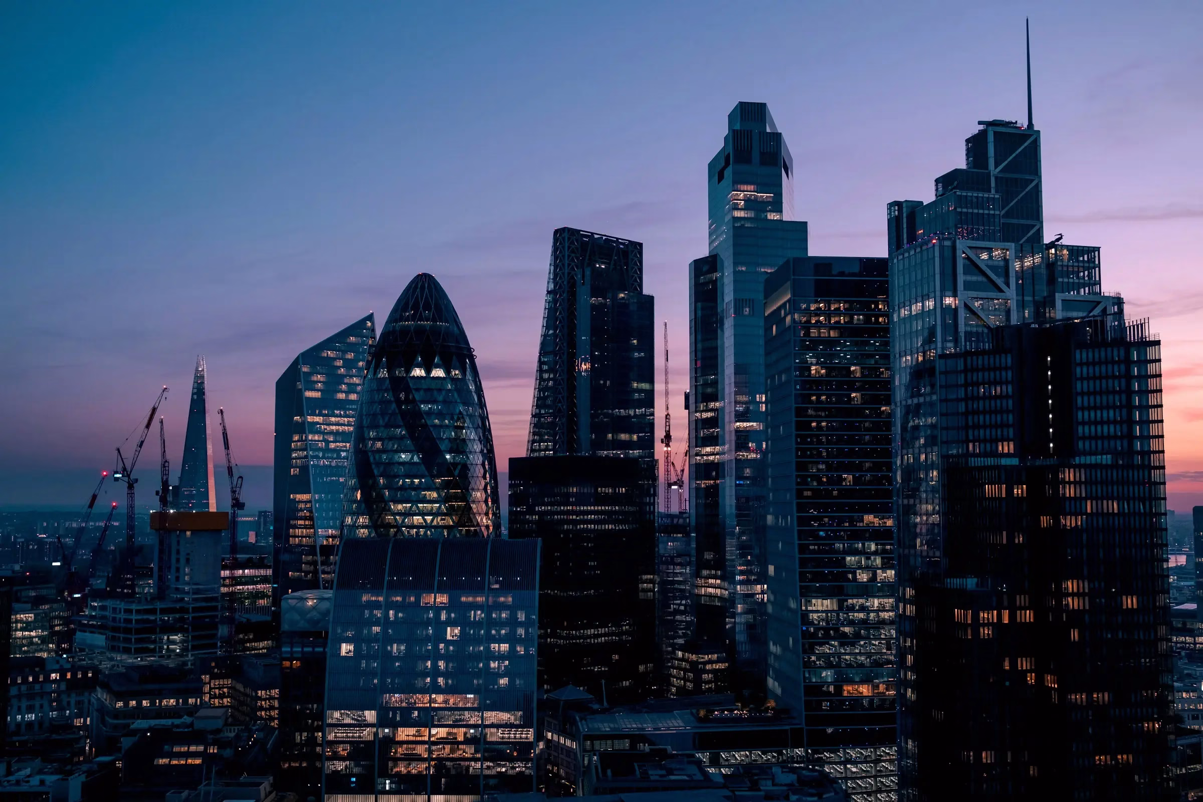 London skyline at sunset, modern architecture.