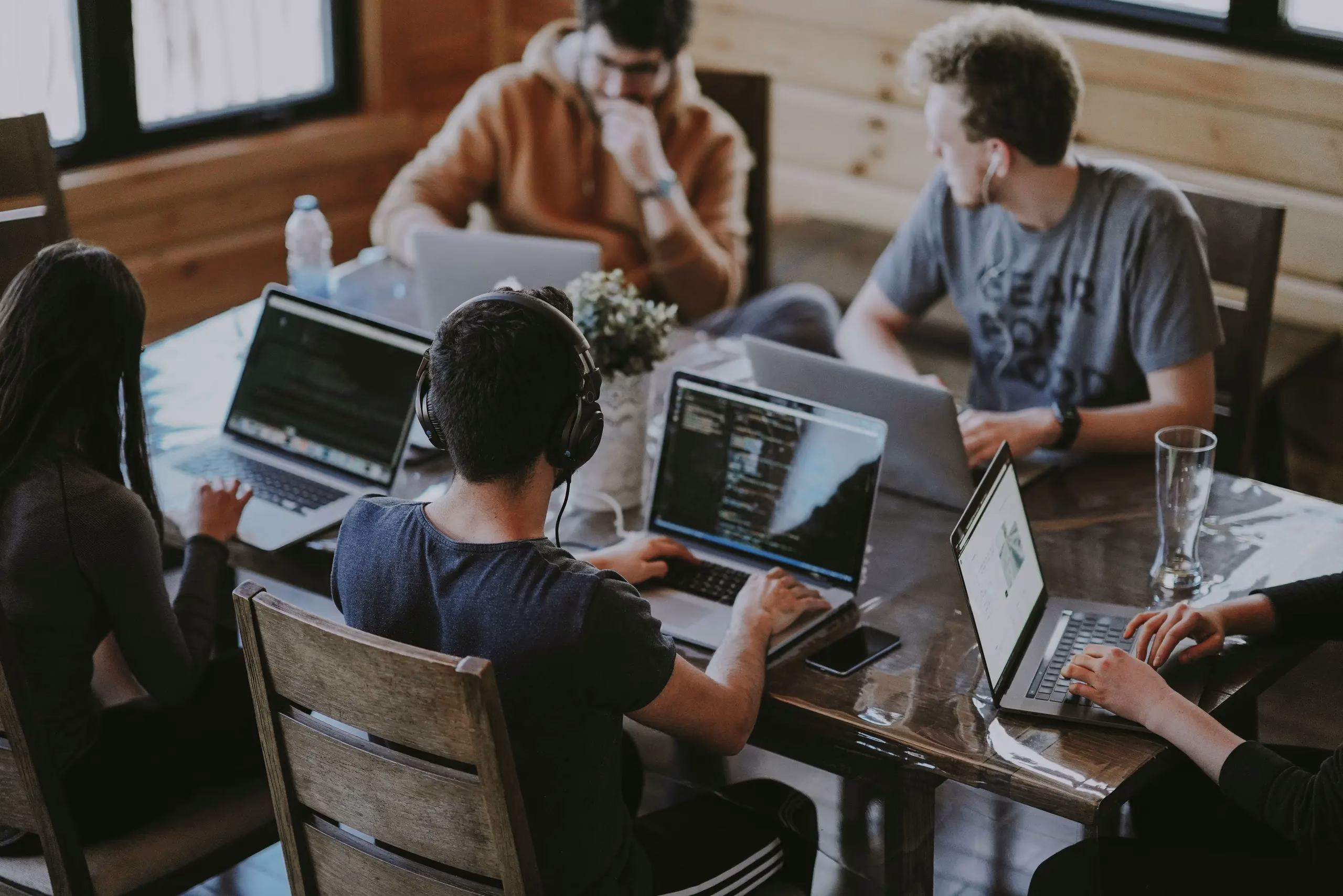 Group of people collaborating around a table