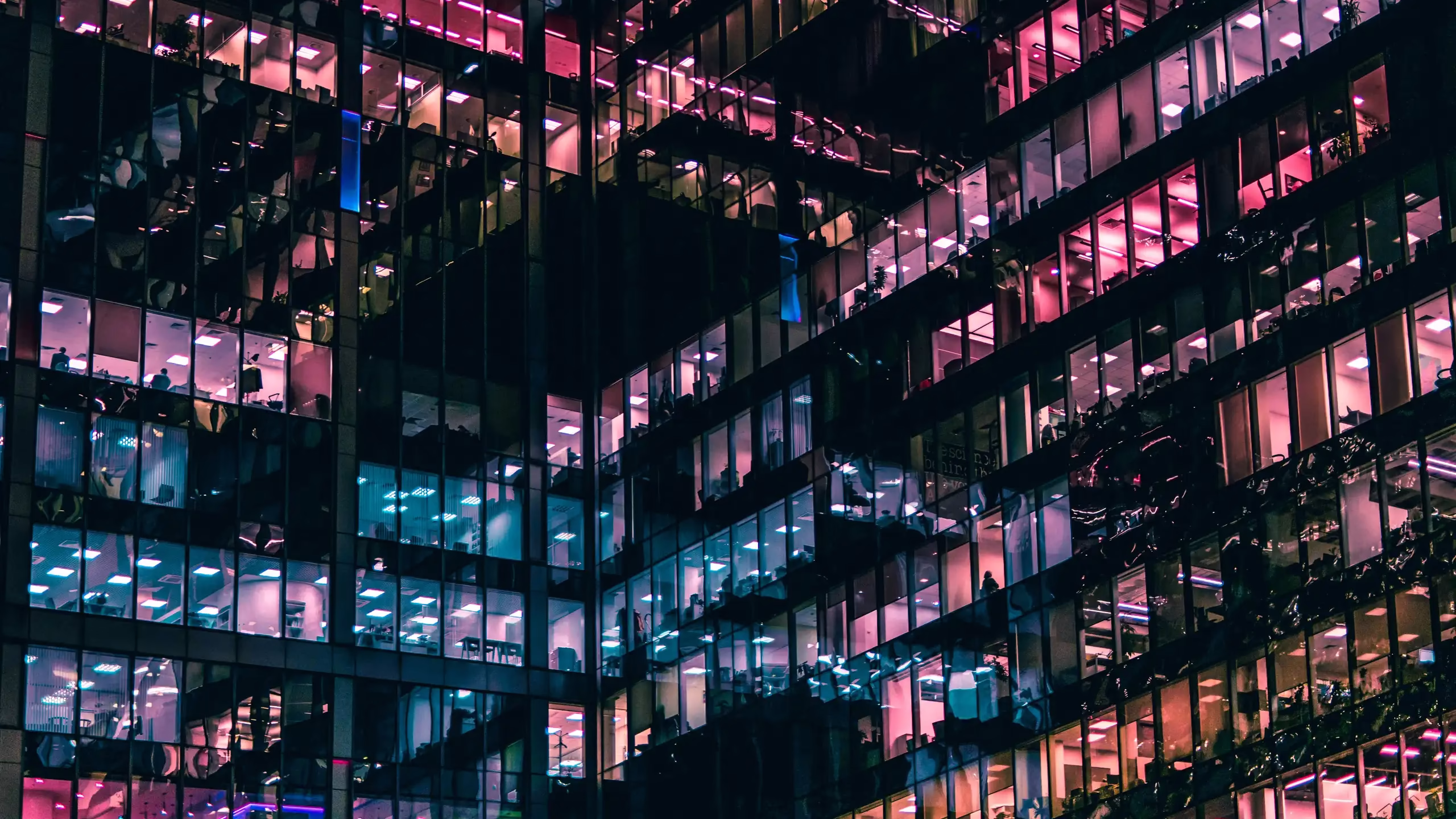 Photo of office building at night