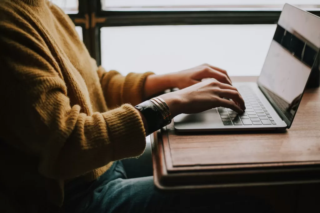 Person working on a laptop computer