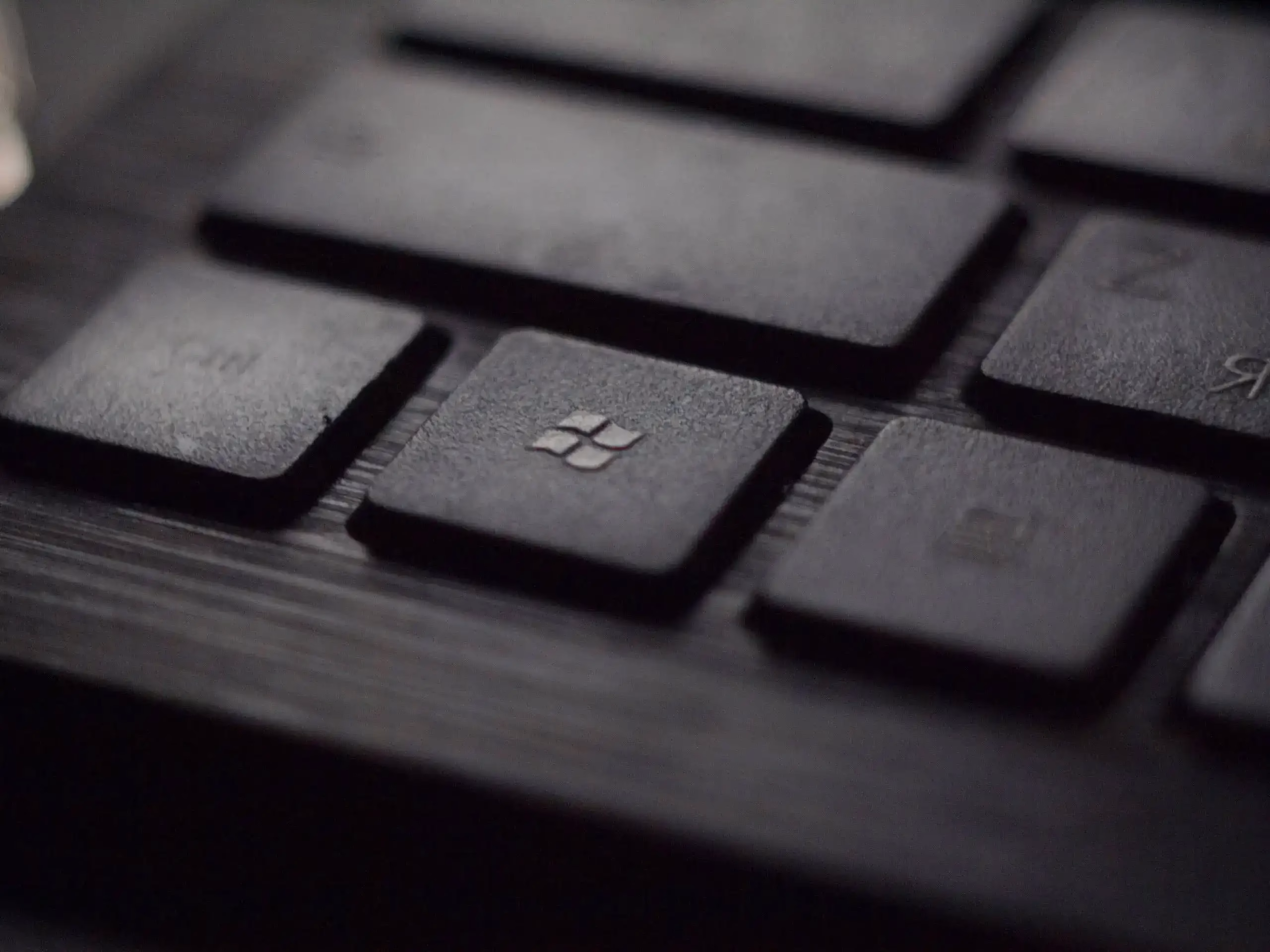 Close up photo of a Windows key on a keyboard
